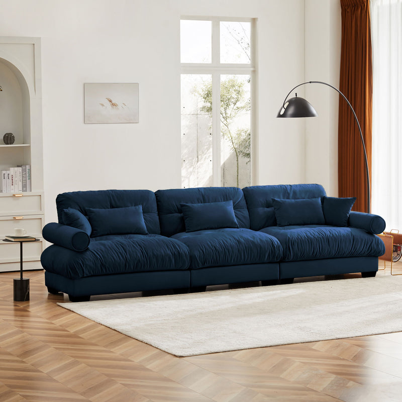 Modern Sofa With Bolstered Armrests And Pillows